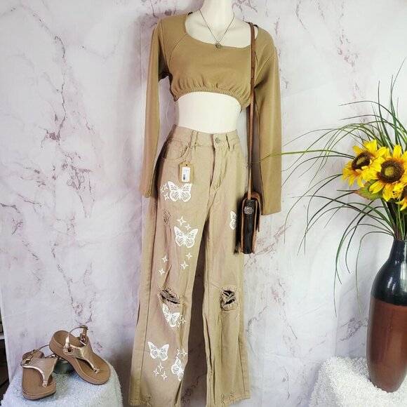 Butterfly embossed khaki jeans with intentional distressing - Picture 1 of 4